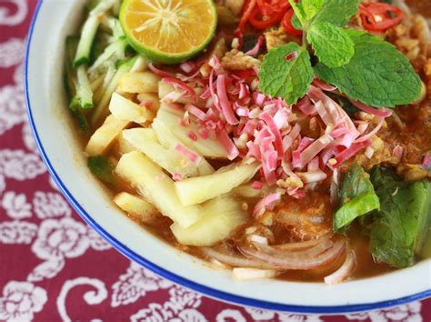  Laksa Penang : Une Symphonie D'Épices en Explosion de Saveurs Tropicales !