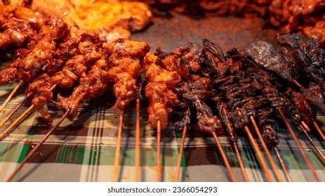  Suya : Un voyage épicé à travers les saveurs fumées du nord du Nigeria !